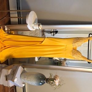 Brand new dress . Never worn . Long with slit